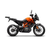 Fixation pour Top Case KTM Adventure 390 - LE PRATIQUE DU MOTARD