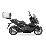 Fixation pour Top Case SYM Adx 125 - LE PRATIQUE DU MOTARD