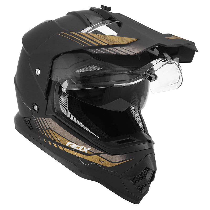 Casque cross/trail ADX AC900 Noir/Or Mat — écran relevé sous la visière, pare-soleil intégré abaissé