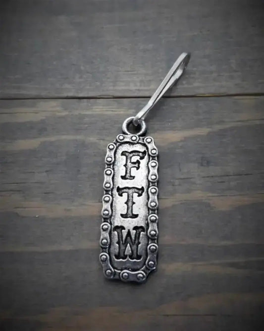 Tirant de fermeture éclair Bravo Bells " FTW" - Le Pratique du Motard